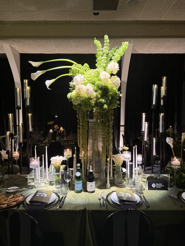 Cascading artistic florals are recommended for 2026 weddings by Krissy Thiessen, a Windsor-essex wedding florist 