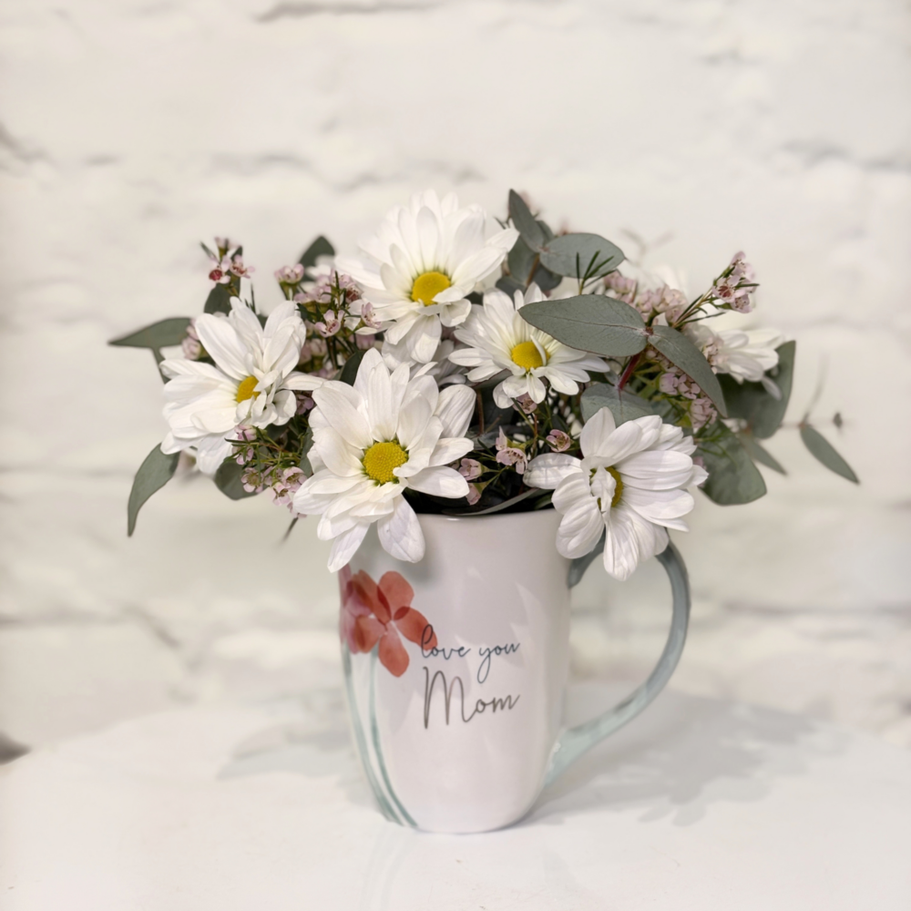love you mom mug filled with beautiful fresh flowers for mother's day